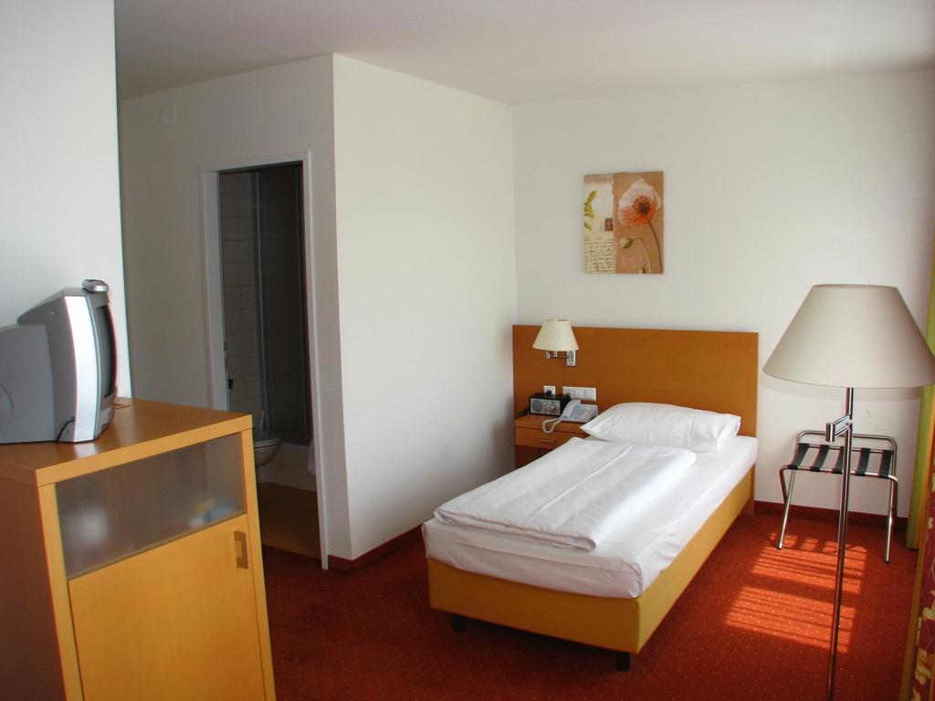 Familienresidenz Hotel Филах Стая снимка